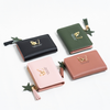 Cartera Compacta "Weston Cloucie" con Dije de Mariposa